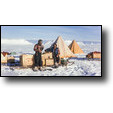 Sergei Abakumov (then a Soviet exchange scientist) and John Attig (then a University of Maine graduate student) having lunch next to the threadbare tent. (PAM)